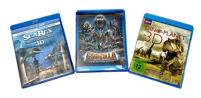Three dinosaur-themed Blu-ray cases, including "Dinosaur Planet 3D," displayed for product sale.