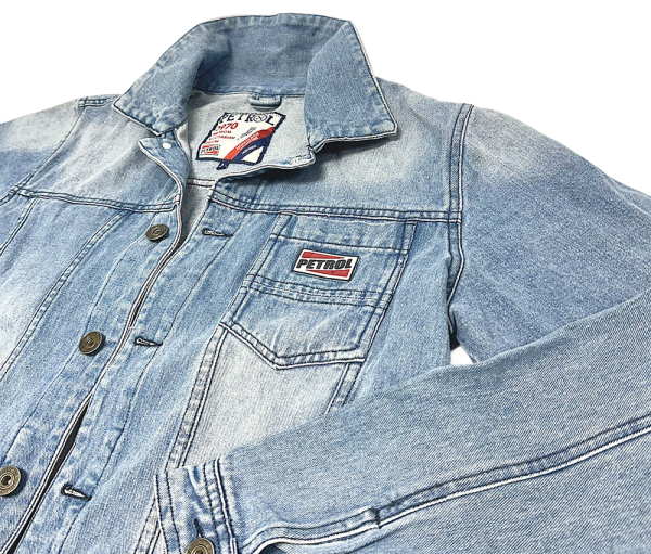 Light blue Petrol denim jacket with button closure and chest pocket featuring the Petrol logo patch.