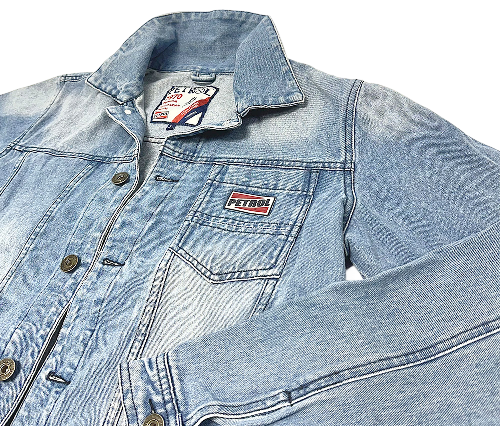 Light blue Petrol denim jacket with button closure and chest pocket featuring the Petrol logo patch.