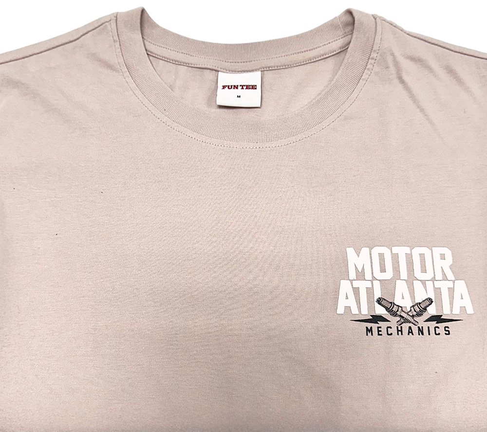 Light gray FunTee t-shirt with "Motor Atlanta Mechanics" and wrenches graphic on the chest.