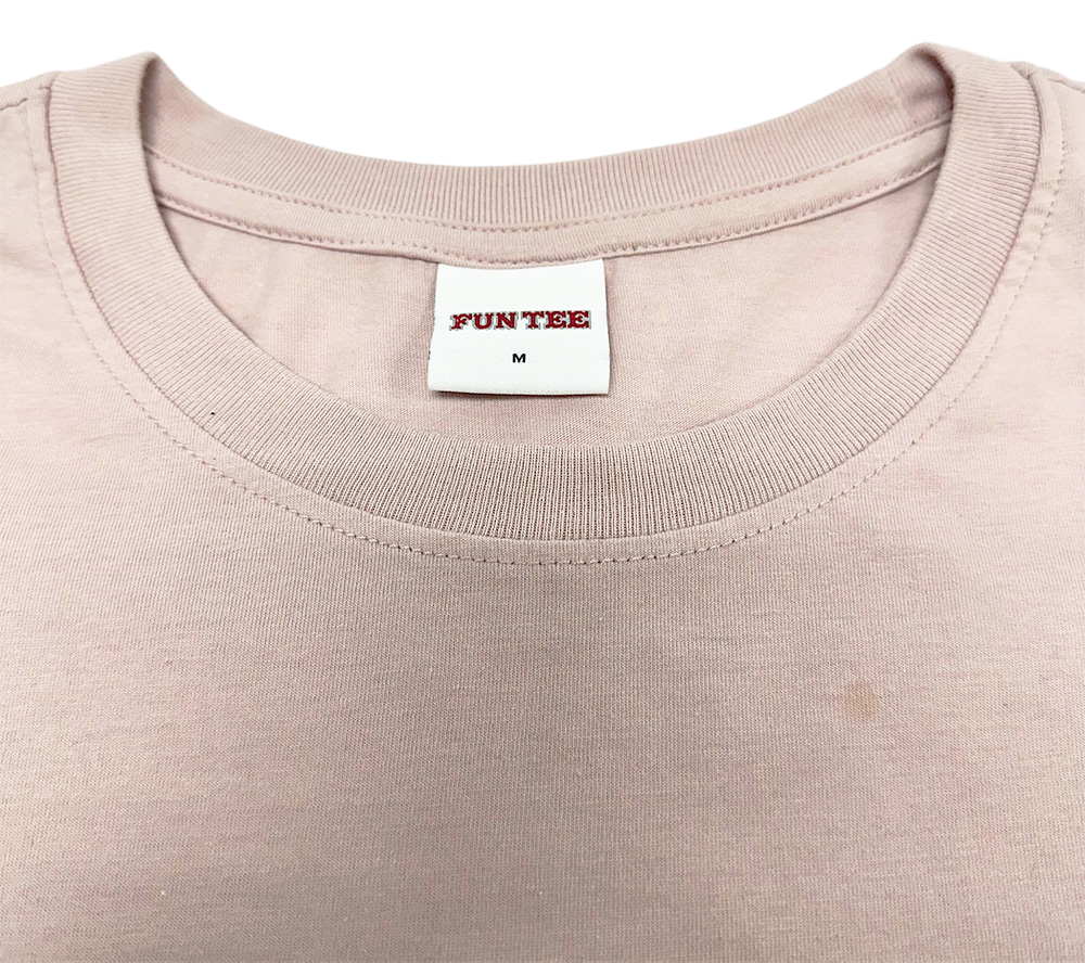 Close-up of FunTee Motor Atlanta Shirt collar and tag, showing shirt material and stitching detail.