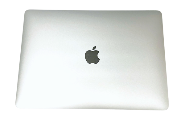 Closed silver MacBook Air displaying the Apple logo on the lid.