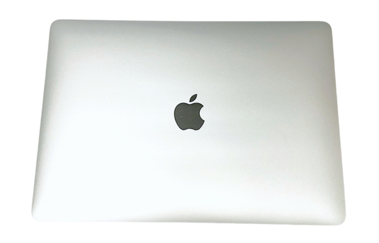 Closed silver MacBook Air displaying the Apple logo on the lid.