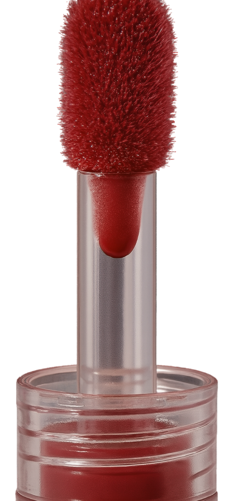 Close-up of a Bare n Bliss Lip Tint applicator with deep red liquid lip color.