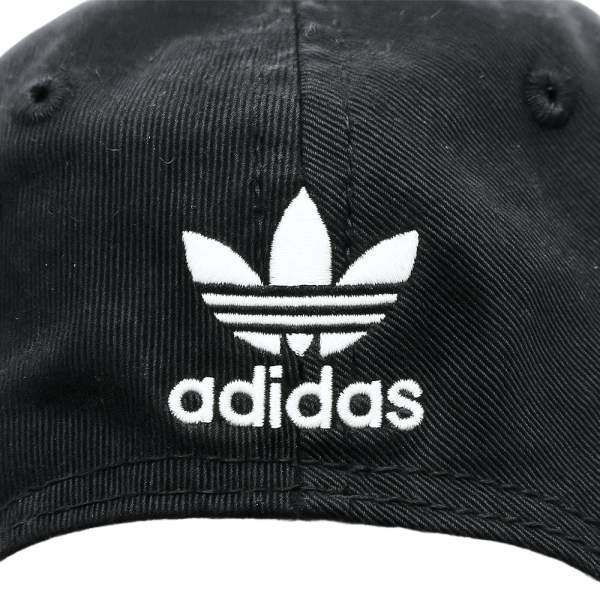 Close-up of a black Adidas Originals cap featuring the white Trefoil logo and "adidas" text on the front.