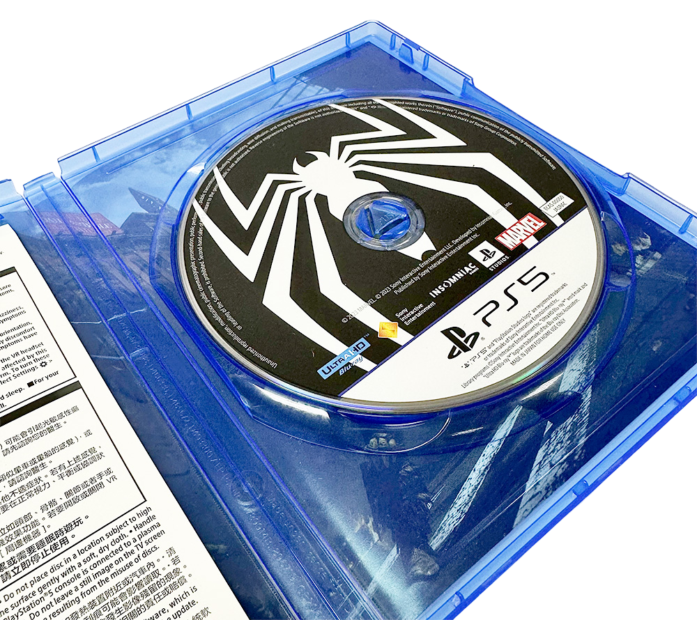 Close-up of Marvel's Spider-Man 2 PS5 game disc inside its open blue plastic case.