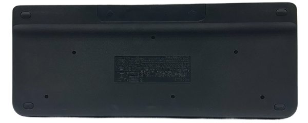 Back view of the Logitech K400 Wireless Keyboard showing its battery compartment and product label.