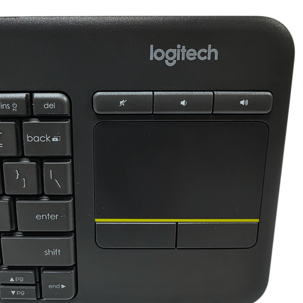 Close-up of Logitech K400 Wireless Keyboard showing touchpad and media control buttons.