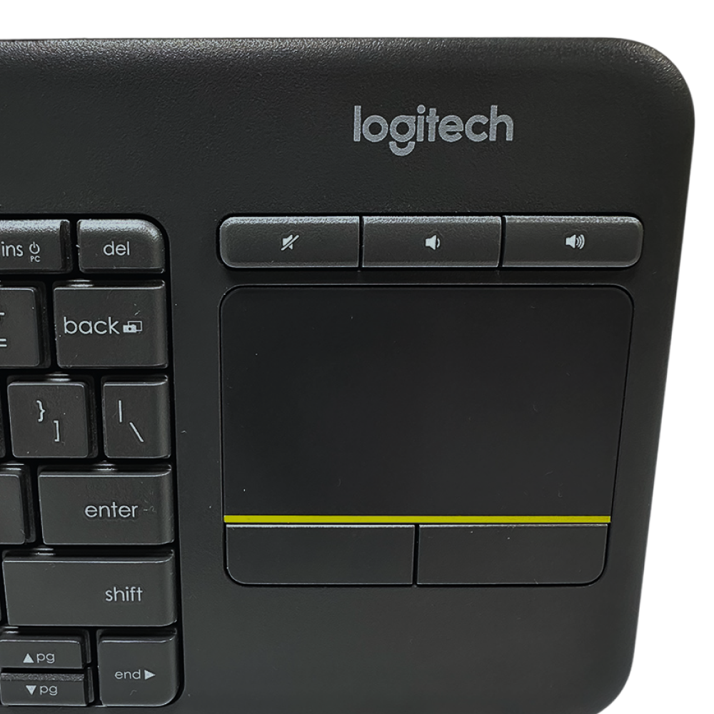 Close-up of Logitech K400 Wireless Keyboard showing touchpad and media control buttons.