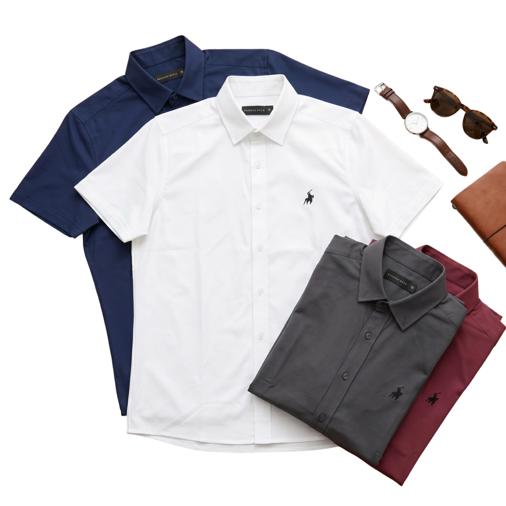 Men's fashion shirts, British Polo short sleeve in navy, white, grey, and maroon displayed with accessories.