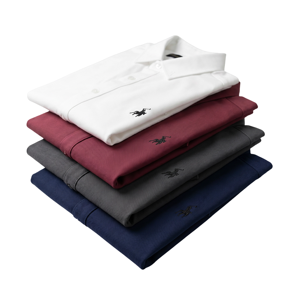 Stack of British Polo short sleeve men's fashion shirts in white, red, gray, and navy blue.