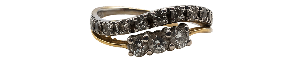 White gold diamond ring with a wavy band design, featuring rows of sparkling diamonds.