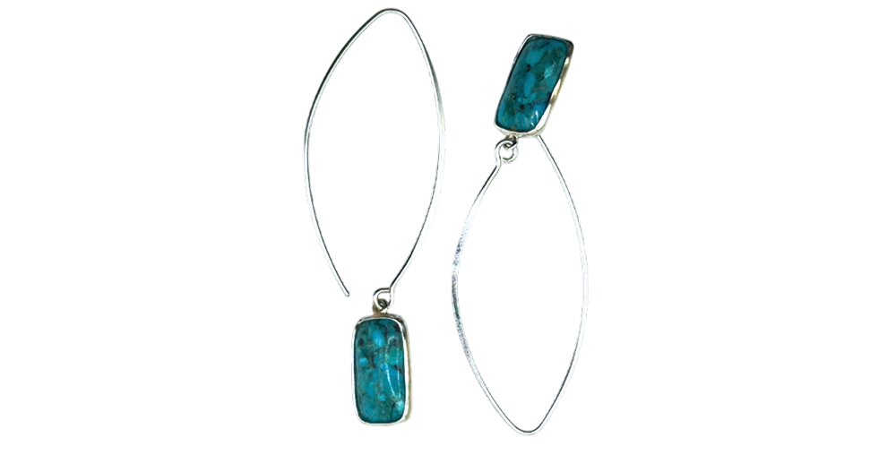 Silver drop earrings with turquoise rectangular stones displayed on a white background.