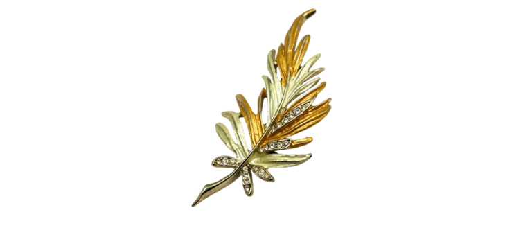 Keyword 1: Elegant two-tone gold leaf brooch with intricate detailing and sparkling accents.