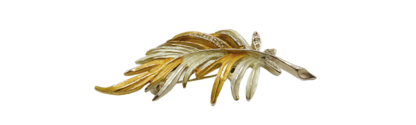 Keyword 1 elegant two-tone gold leaf brooch with detailed leaf design, perfect jewelry accessory for any outfit.