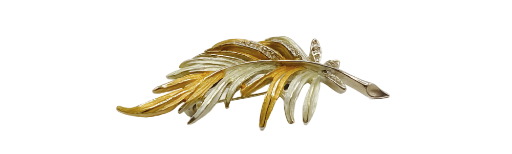 Keyword 1 elegant two-tone gold leaf brooch with detailed leaf design, perfect jewelry accessory for any outfit.