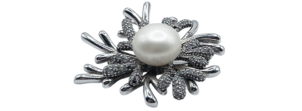 Silver Coral Accent Brooch Pin featuring a round pearl centerpiece and textured silver coral branches.