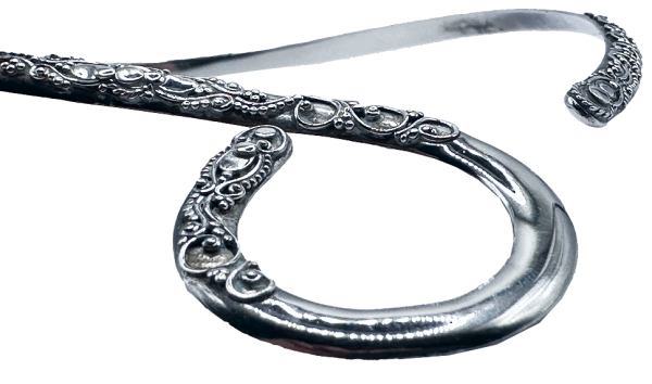 Close-up of the Silver Loop Open Collar Necklace with intricate engraved detailing on both ends.