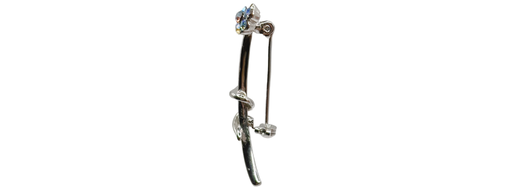 Silver floral crystal brooch with a stem design and sparkling gem accents.