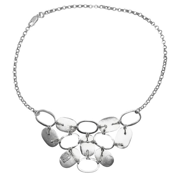 Silver disc necklace with multiple oval and round pendants on a delicate chain, displayed against a white background.
