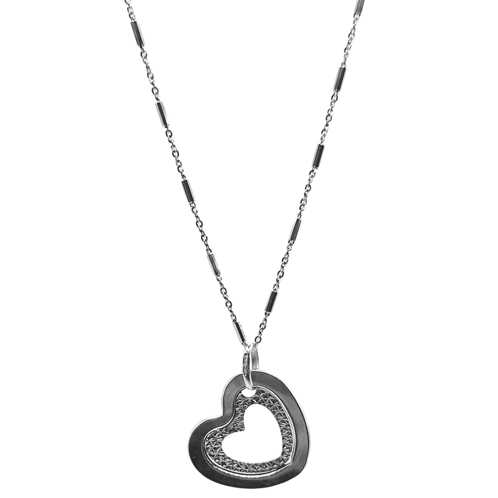 Silver heart pendant necklace with textured open-heart charm on a delicate chain.
