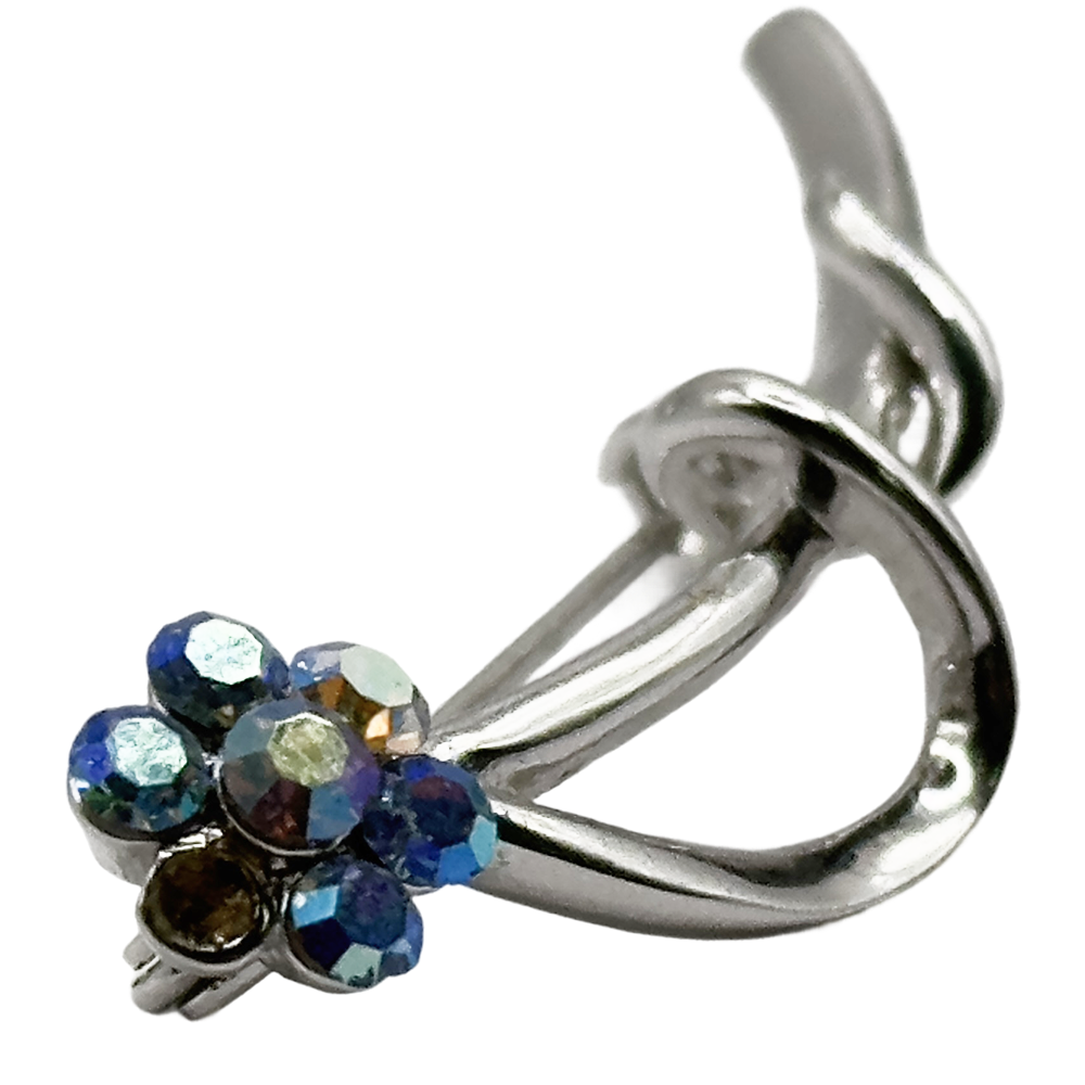 Silver-tone floral crystal brooch with blue iridescent gemstones arranged in a flower pattern.