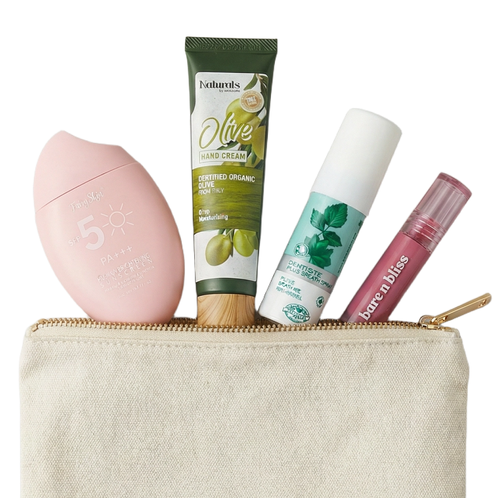 Four travel-sized skincare products partially inside a beige pouch, suitable for travel essentials.